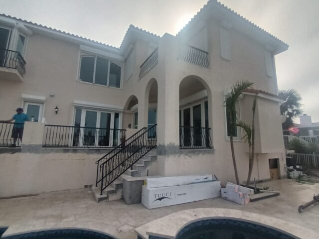 Custom fabrication and installation of home stair hand rail. Black powder coated aluminum. Shonefelt Welding and Fabrication in Clearwater Florida